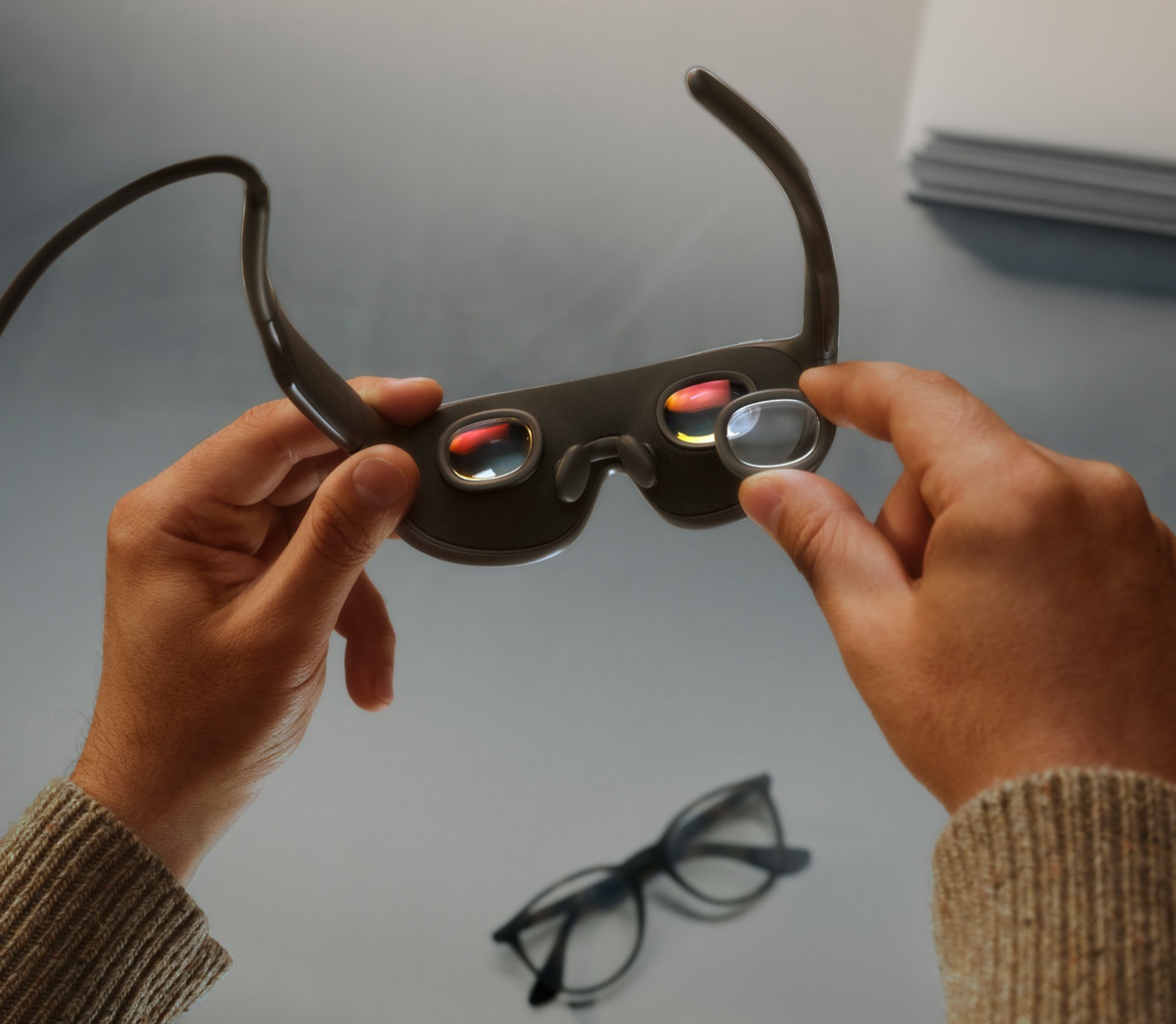 The inside of Meta VR Glasses, with a prescription lens insert being fitted